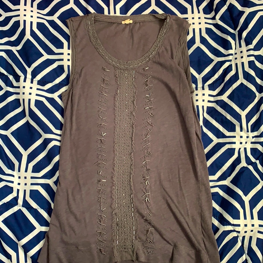 Grey top with rhinestones.